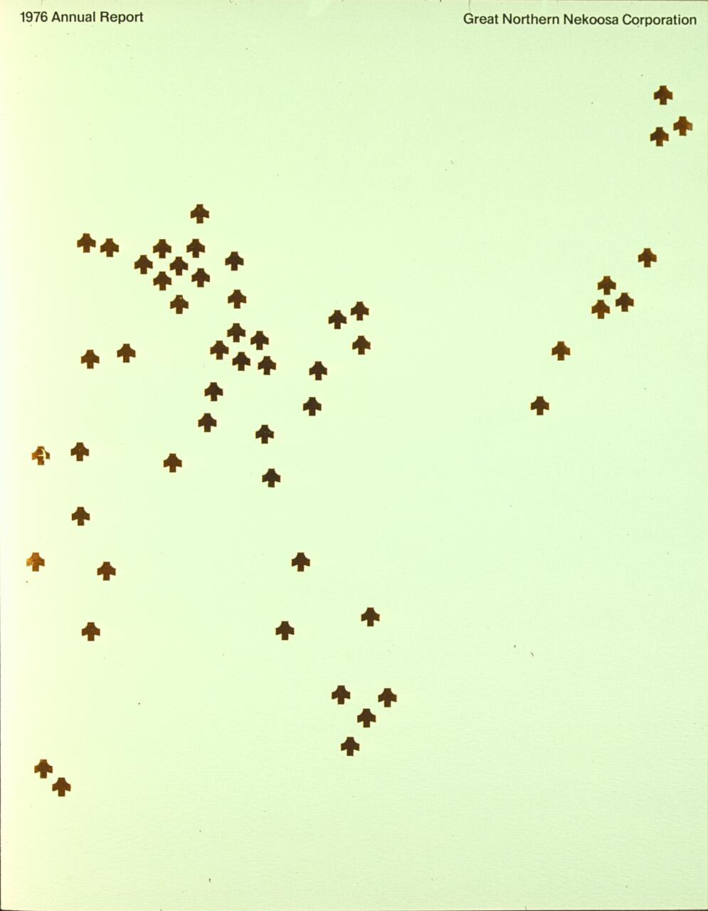 Abstract design with small, brown cross-shaped symbols scattered randomly on a plain, light green background.