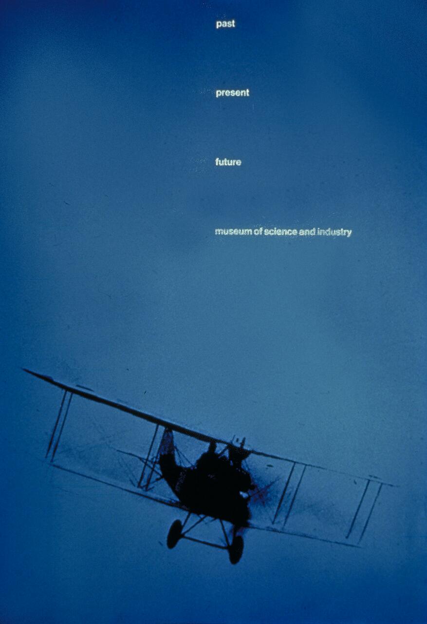 Vintage biplane silhouette against a deep blue sky.