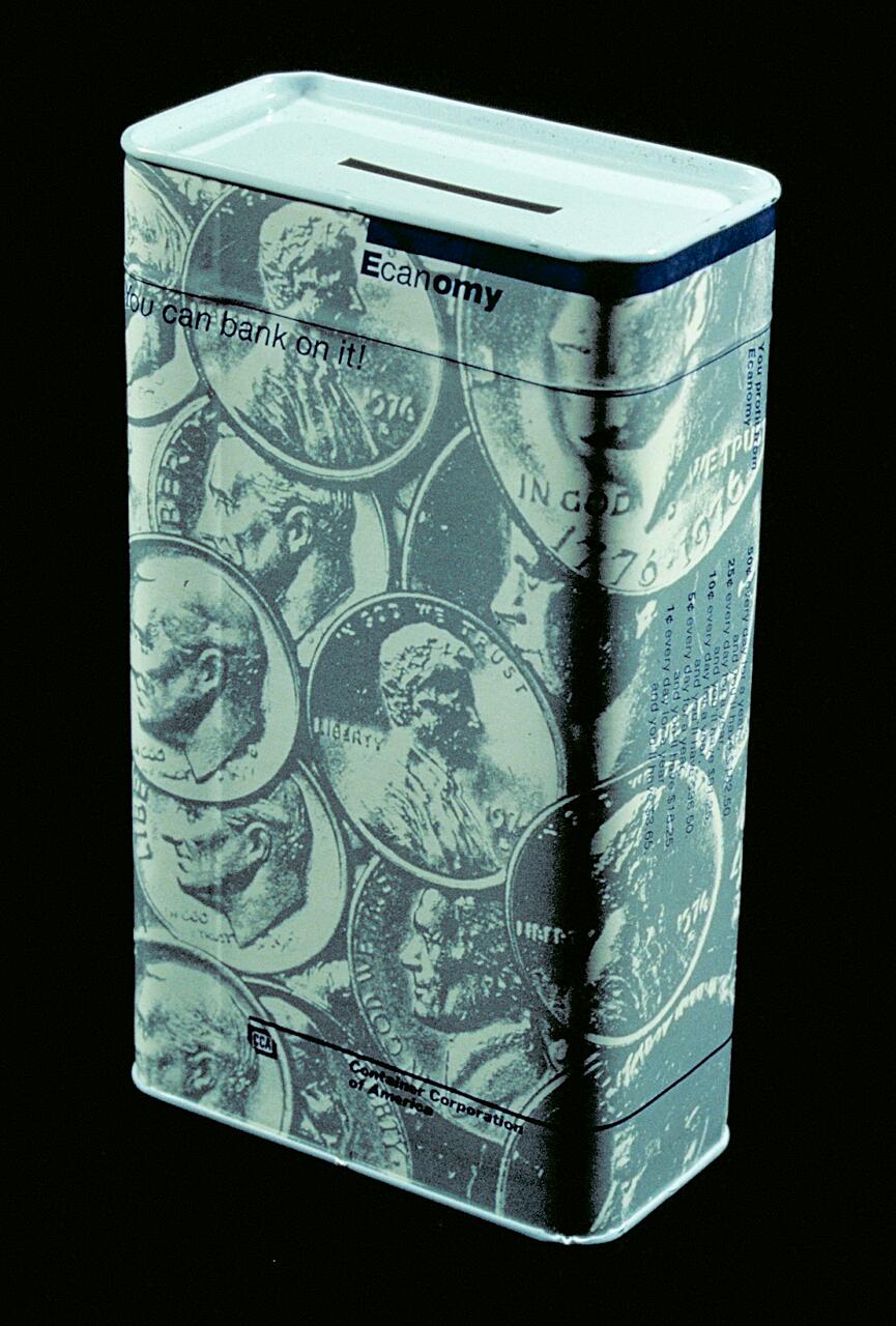 Tin coin bank with a slot on top, covered in designs of U.S. coins featuring presidents’ profiles, against a black background. Text reads "Economy" and "You can bank on it!"