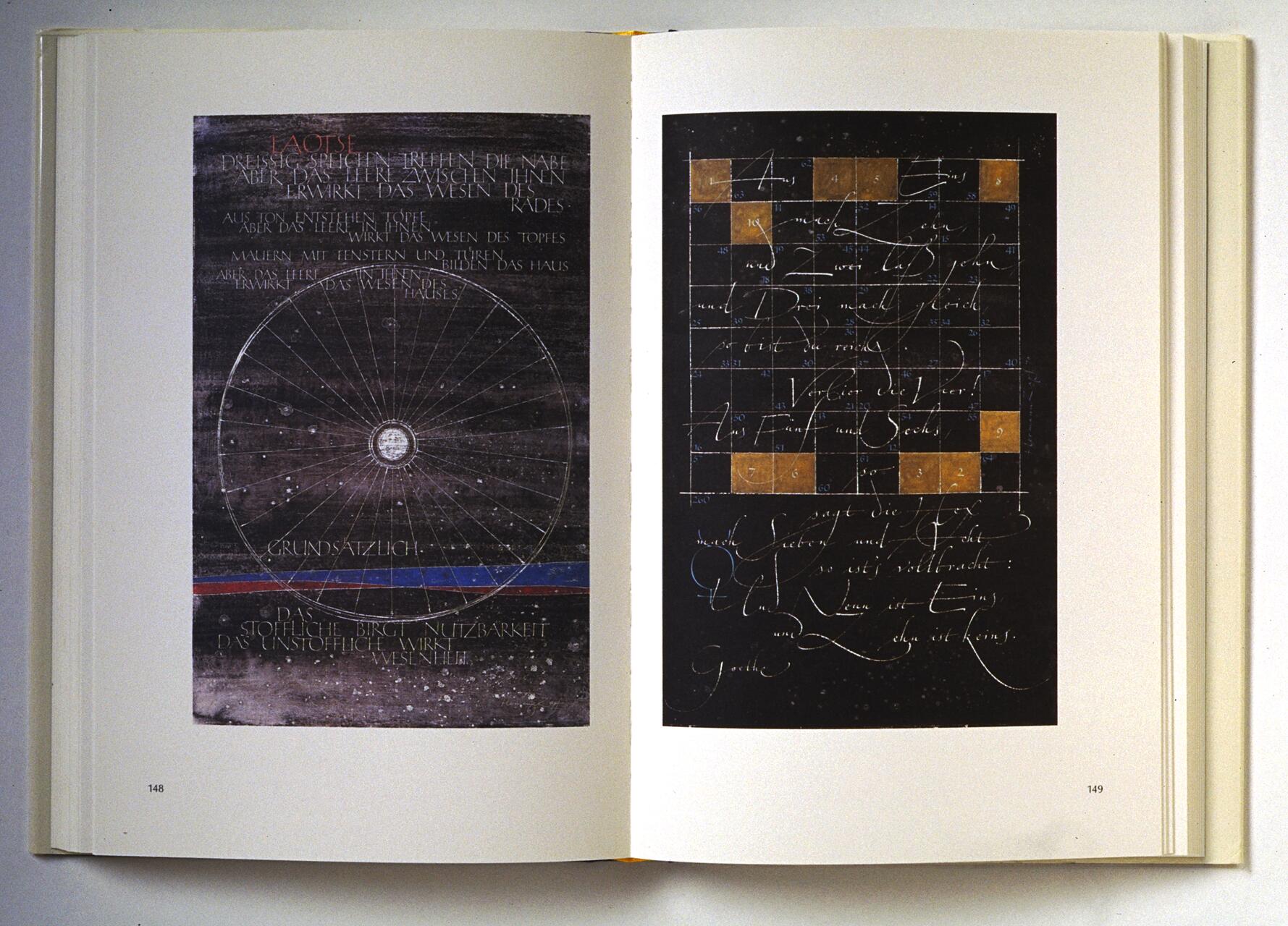 Open book layout featuring two pages with stylized text and abstract designs. The left page displays a circular pattern with German text above and below. The right page has a grid of squares with flowing calligraphy overlaid in an artistic manner.