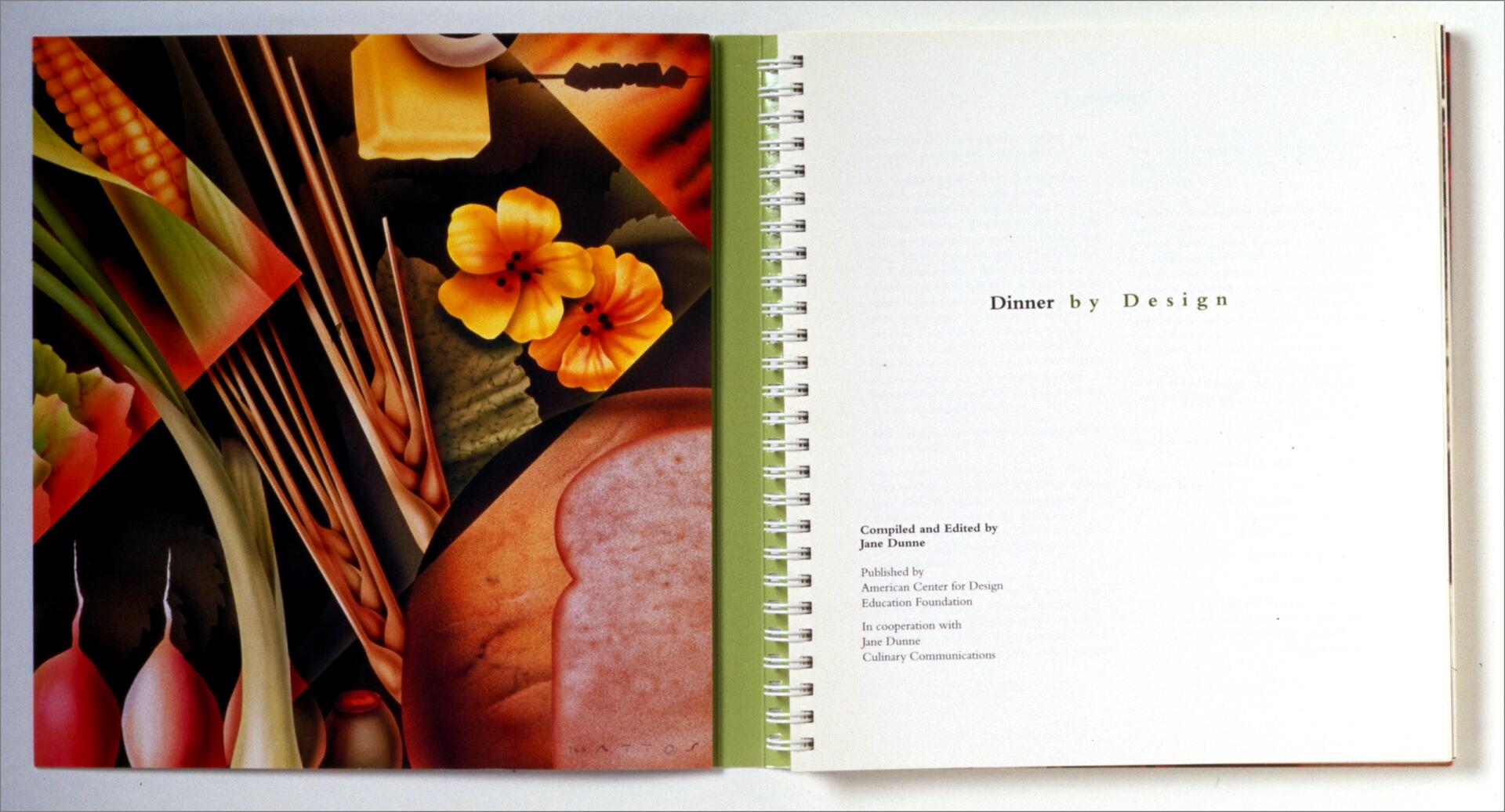 Open book displaying colorful food-themed artwork on the left page, including corn, wheat, flowers, and radishes. The right page is titled "Dinner by Design" with credits below.