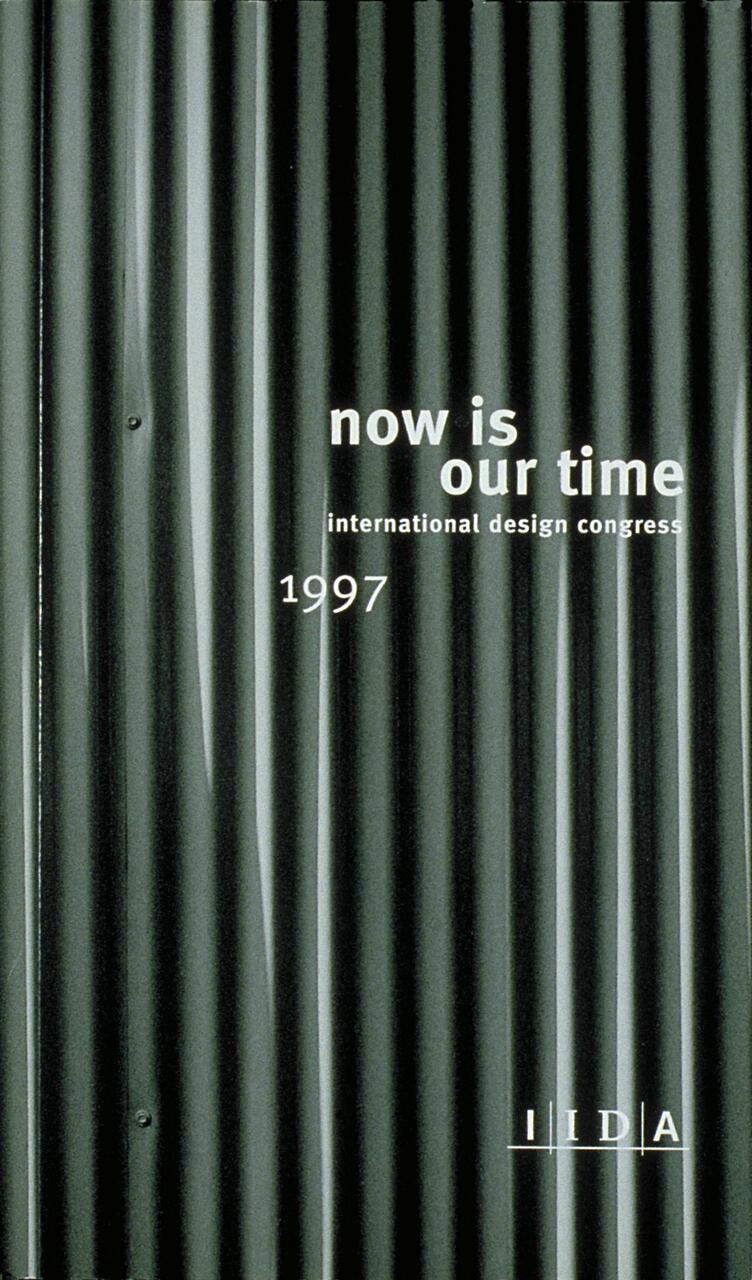 Vertical corrugated metal with text "now is our time, international design congress, 1997" and "IIDA" logo in white.
