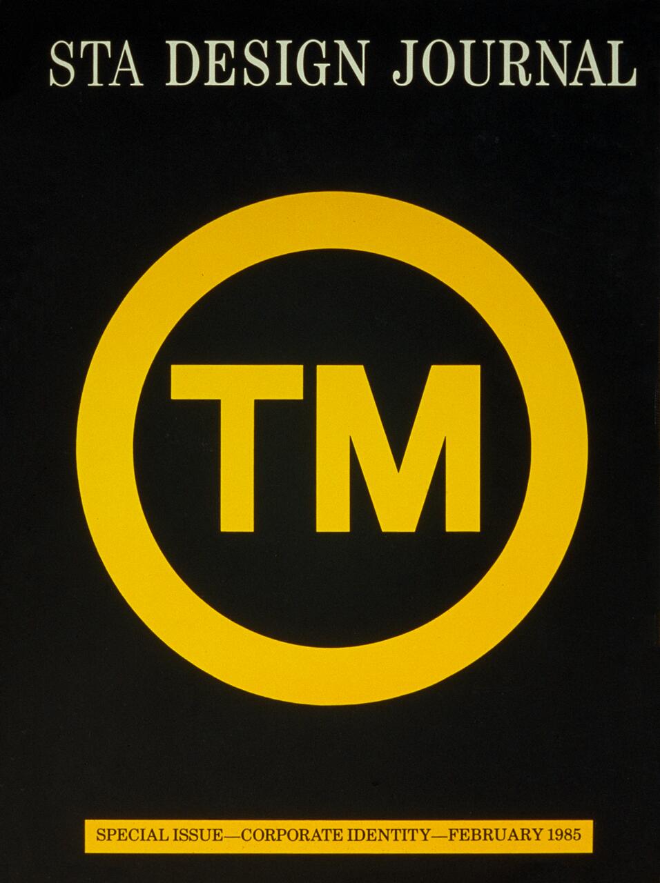 STA Design Journal cover with a large yellow circle containing the letters "TM" on a black background. Text at the top and bottom indicates a special issue on corporate identity, dated February 1985.