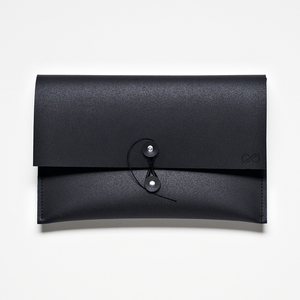 16C-118_Lug Case - iPad case made from recycled tire rubber and recycled PET felt_Sharon Burdett/Ted Burdett