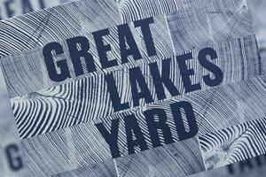 16A-36_"Great Lakes Yard" text on a wood grain patterned background in blue tones_Nick Adam