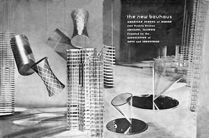 26A-09A_School of Design Catalog: Abstract design featuring geometric shapes and chrome structures, including cylinders and cones, set against a dark backdrop. The text on the right side refers to the New Bauhaus American School of Design.